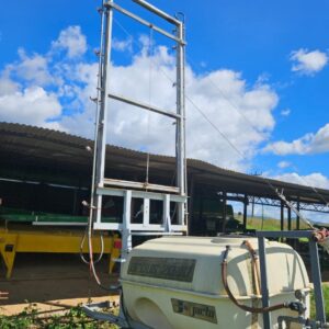 Used Jacto mister sprayer for Pecan Nut trees on farm in South Africa under blue sky