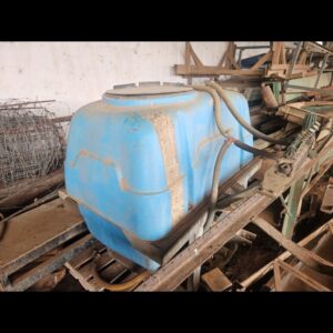 Photo of pre‑owned blue 600 L mounted spray tank—HDPE, serviced, ready for tractor mounting in South Africa