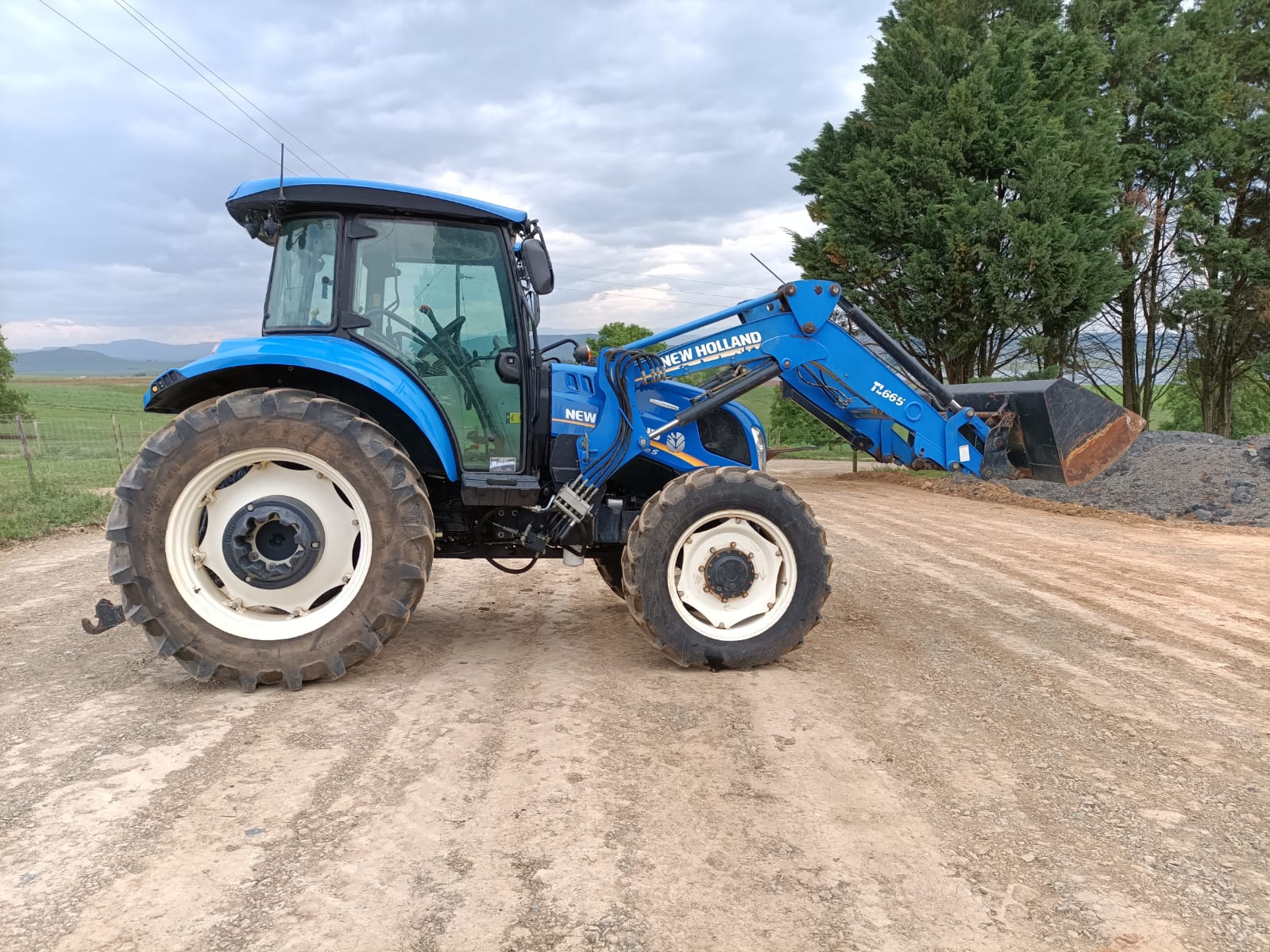 2021 New Holland model T5110 + loader and bucket